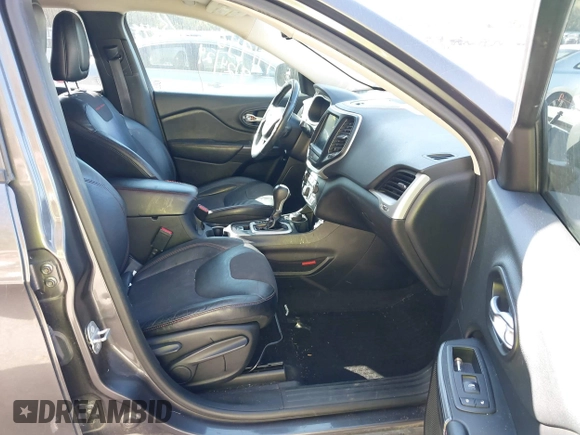 2014 Jeep Cherokee Trailhawk with VIN 1C4PJMBB0EW237741, listed as a IAAI auction lot 40505251 with 139,883 mi miles and . Bid and sale history available at DreamBid. Image 5.