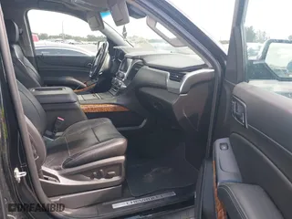 2017 Chevrolet Suburban Premier with VIN 1GNSCJKC4HR127667, listed as a IAAI auction lot 41936945 with 139,006 mi miles. Bid and sale history available at carsss.com. Image 5.