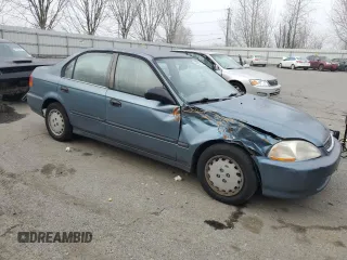 1997 Honda Civic DX with VIN JHMEJ6628VS031179, listed as a Copart auction lot 47281135 with 275,267 mi miles and Salvage Title. Bid and sale history available at DreamBid. Image 4.