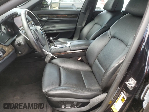 2012 BMW 7 Series 740Li with VIN WBAKB4C5XCC576227, listed as a Copart auction lot 52946135 with 154,611 mi miles and Salvage Title. Bid and sale history available at carsss.com. Image 7.