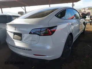 2022 Tesla Model 3 Long Range with VIN 5YJ3E1EB1NF236969, listed as a IAAI auction lot 41525117 with 24,215 mi miles and . Bid and sale history available at DreamBid. Image 4.