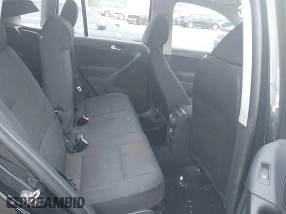 2013 Volkswagen Tiguan S with VIN WVGAV3AX4DW572884, listed as a IAAI auction lot 41626981 with 243,188 mi miles and . Bid and sale history available at DreamBid. Image 8.
