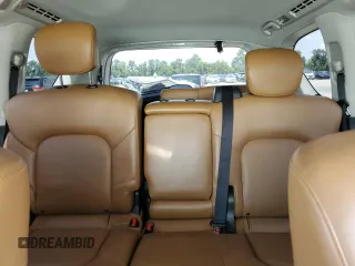 2017 Infiniti QX80 with VIN JN8AZ2ND0H9830667, listed as a Copart auction lot 58690014 with 124,251 mi miles and Clean Title. Bid and sale history available at carsss.com. Image 10.