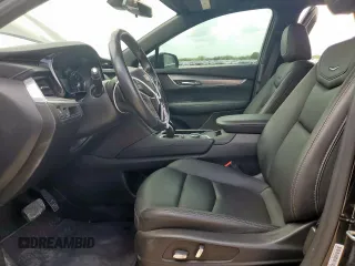 2021 Cadillac XT5 FWD Luxury with VIN 1GYKNAR42MZ120996, listed as a Copart auction lot 63314655 with 49,977 mi miles and Salvage title. Bid and sale history available at DreamBid. Image 7.