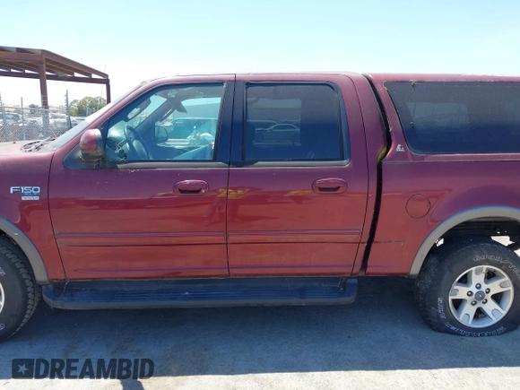 2003 Ford F-150 XLT with VIN 1FTRW08L63KA20475, listed as a IAAI auction lot 42610305 with Not provided miles and . Bid and sale history available at DreamBid. Image 14.