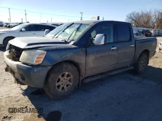 2004 Nissan Titan LE with VIN 1N6AA07B14N517998, listed as a Copart auction lot 41405895 with 0 mi miles and Salvage Title. Bid and sale history available at carsss.com. Image 1.