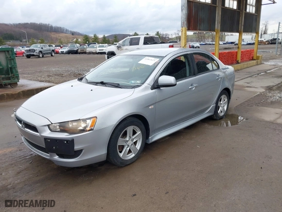 2013 Mitsubishi Lancer SE with VIN JA32V2FW7DU015061, listed as a IAAI auction lot 41863621 with 141,315 mi miles. Bid and sale history available at carsss.com. Image 2.