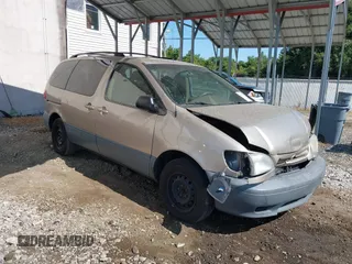 2002 Toyota Sienna LE with VIN 4T3ZF13C82U465335, listed as a IAAI auction lot 40274809 with 178,560 mi miles and . Bid and sale history available at DreamBid. Image 1.