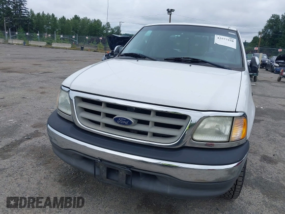 2002 Ford F-150 XL with VIN 1FTRX17L32NA19687, listed as a IAAI auction lot 42577258 with 216,685 mi miles and . Bid and sale history available at DreamBid. Image 6.