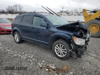 2014 Dodge Journey SXT with VIN 3C4PDCBB2ET156070, listed as a Copart auction lot 51189955 with 82,638 mi miles and Salvage Title. Bid and sale history available at DreamBid. Image 4.