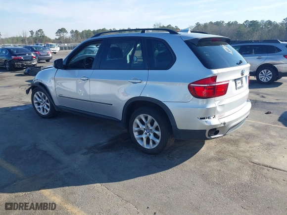 2011 BMW X5 35i with VIN 5UXZV4C5XBL412661, listed as a IAAI auction lot 41810470 with 168,470 mi miles. Bid and sale history available at carsss.com. Image 3.