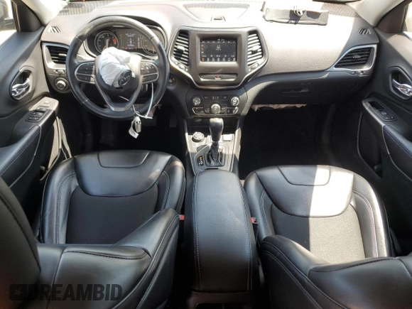 2019 Jeep Cherokee Latitude Plus with VIN 1C4PJMLBXKD233718, listed as a Copart auction lot 58933435 with 56,413 mi miles and Salvage title. Bid and sale history available at DreamBid. Image 8.