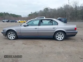 1998 BMW 7 Series 740il with VIN WBAGJ8323WDM23239, listed as a IAAI auction lot 41512630 with 221,673 mi miles. Bid and sale history available at carsss.com. Image 15.