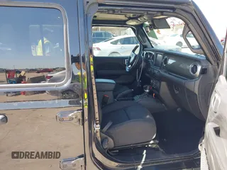 2023 Jeep Wrangler Sahara with VIN 1C4HJXEN5PW508257, listed as a IAAI auction lot 42007569 with 34,990 mi miles and . Bid and sale history available at DreamBid. Image 5.