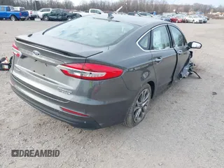2019 Ford Fusion Hybrid Titanium with VIN 3FA6P0RU9KR158129, listed as a IAAI auction lot 41717104 with 37,736 mi miles. Bid and sale history available at carsss.com. Image 4.