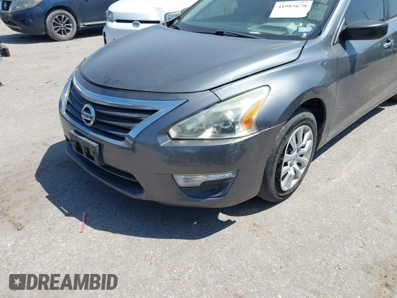 2015 Nissan Altima S with VIN 1N4AL3AP0FN324897, listed as a IAAI auction lot 41983678 with 184,042 mi miles and . Bid and sale history available at DreamBid. Image 11.