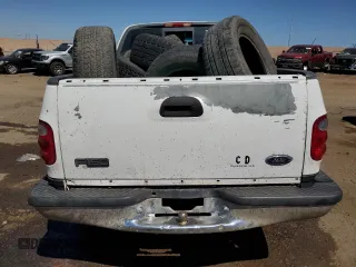 2000 Ford F-150 XL with VIN 1FTZF0727YKA84301, listed as a Copart auction lot 71593544 with 0 mi miles and Salvage Title. Bid and sale history available at carsss.com. Image 6.