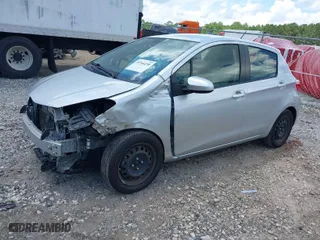 2012 Toyota Yaris L with VIN JTDKTUD33CD527720, listed as a IAAI auction lot 39764258 with 118,041 mi miles. Bid and sale history available at carsss.com. Image 2.