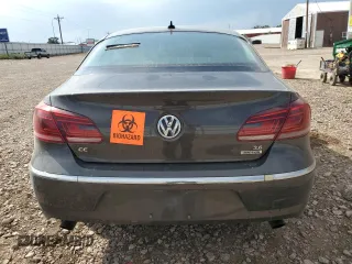 2014 Volkswagen CC VR6 Executive 4Motion with VIN WVWGU7AN9EE523145, listed as a Copart auction lot 71419134 with 94,547 mi miles and Salvage Title. Bid and sale history available at carsss.com. Image 6.