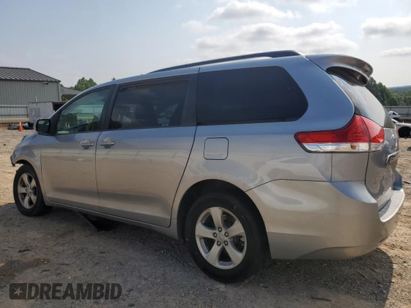 2012 Toyota Sienna LE AAS with VIN 5TDKK3DC8CS193671, listed as a Copart auction lot 63836955 with 257,868 mi miles and Salvage title. Bid and sale history available at DreamBid. Image 2.