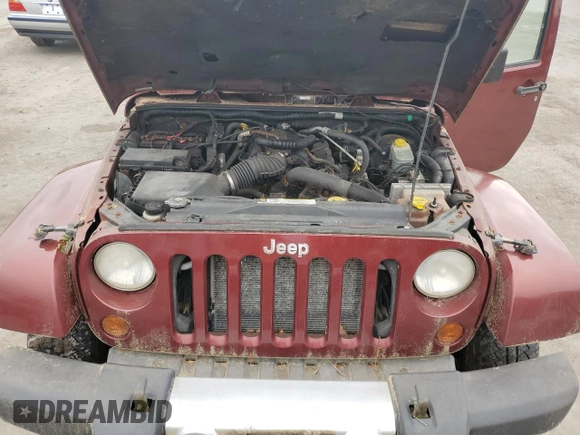 2008 Jeep Wrangler Unlimited Sahara z VIN 1J8GA59108L648333, wystawiony jako Copart lot #57430015 z przebiegiem 506 770 mil mil oraz Czysty tytuł • Clean title. Historia ofert i sprzedaży dostępna na DreamBid. Obrazek 11.