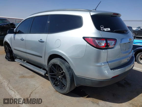 2015 Chevrolet Traverse LS with VIN 1GNKRFEDXFJ388491, listed as a IAAI auction lot 41700140 with 156,233 mi miles and . Bid and sale history available at DreamBid. Image 3.