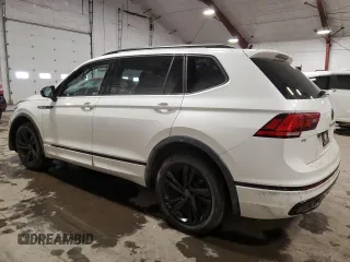 2023 Volkswagen Tiguan SE R-Line Black with VIN 3VV8B7AX4PM135217, listed as a Copart auction lot 47221635 with 19,676 mi miles and Salvage title. Bid and sale history available at DreamBid. Image 2.