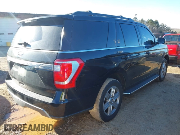 2021 Ford Expedition XLT with VIN 1FMJU1JT7MEA47795, listed as a IAAI auction lot 41339851 with 86,662 mi miles. Bid and sale history available at carsss.com. Image 4.