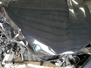 2019 BMW 7 Series 740i z VIN WBA7E2C57KB454012, wystawiony jako Copart lot #50977775 z przebiegiem Nie podano mil oraz Szkoda całkowita • Salvage title. Historia ofert i sprzedaży dostępna na DreamBid. Obrazek 13.