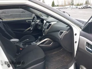 2015 Hyundai Veloster with VIN KMHTC6AD6FU236478, listed as a IAAI auction lot 41923285 with 120,079 mi miles. Bid and sale history available at carsss.com. Image 5.