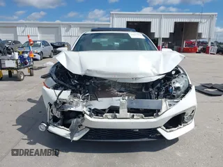 2018 Honda Civic Si with VIN 2HGFC1E53JH700251, listed as a IAAI auction lot 42043732 with 104,763 mi miles and . Bid and sale history available at DreamBid. Image 12.