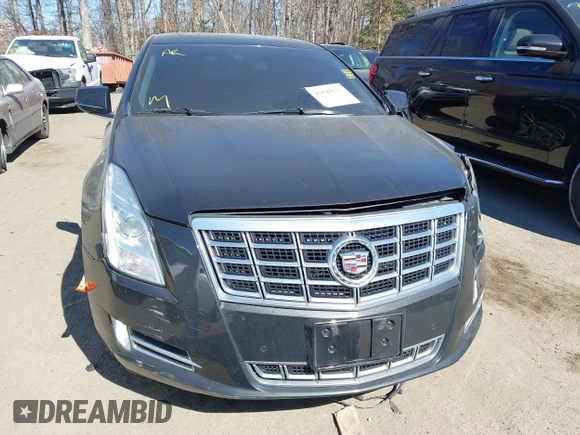 2013 Cadillac XTS Luxury z VIN 2G61R5S33D9184878, wystawiony jako IAAI lot #41644213 z przebiegiem 113 293 mil mil oraz . Historia ofert i sprzedaży dostępna na DreamBid. Obrazek 12.
