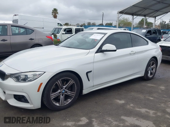 2015 BMW 4 Series 428i with VIN WBA3N7C58FK222925, listed as a IAAI auction lot 41776858 with 106,946 mi miles and . Bid and sale history available at carsss.com. Image 14.