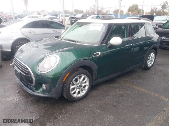 2016 MINI Cooper Clubman with VIN WMWLN5C55G2E07099, listed as a IAAI auction lot 41507429 with 53,271 mi miles. Bid and sale history available at carsss.com. Image 2.