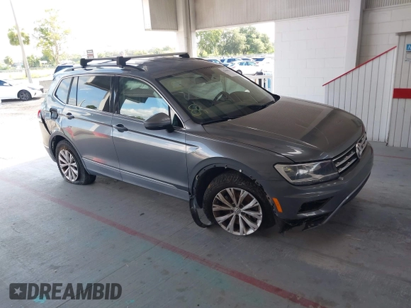 2018 Volkswagen Tiguan SEL with VIN 3VV3B7AXXJM213579, listed as a IAAI auction lot 42664339 with 84,676 mi miles and . Bid and sale history available at DreamBid. Image 1.