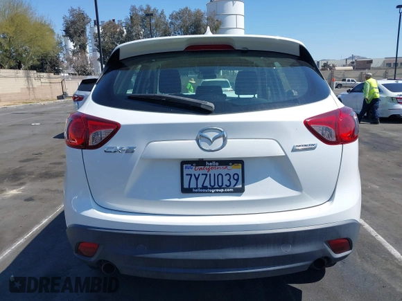 2016 Mazda CX-5 Sport with VIN JM3KE2BY9G0825285, listed as a IAAI auction lot 41841833 with 96,915 mi miles. Bid and sale history available at carsss.com. Image 16.
