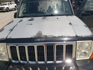 2008 Jeep Commander Sport z VIN 1J8HG48K38C180234, wystawiony jako Copart lot #55959325 z przebiegiem 198 459 mil mil oraz Szkoda całkowita • Salvage title. Historia ofert i sprzedaży dostępna na DreamBid. Obrazek 12.