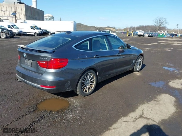 2015 BMW 3 Series Gran Turismo 328i xDrive with VIN WBA3X5C53FD561711, listed as a IAAI auction lot 41523054 with 168,902 mi miles. Bid and sale history available at carsss.com. Image 4.