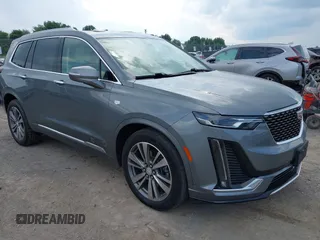 2021 Cadillac XT6 Premium Luxury with VIN 1GYKPDRS9MZ118642, listed as a IAAI auction lot 42664965 with 65,566 mi miles and . Bid and sale history available at DreamBid. Image 1.