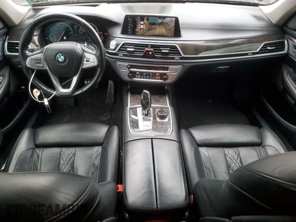2017 BMW 7 Series 740i xDrive with VIN WBA7E4C32HGU99963, listed as a Copart auction lot 65848354 with 99,396 mi miles and Salvage Title. Bid and sale history available at carsss.com. Image 8.