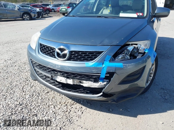 2012 Mazda CX-9 Touring with VIN JM3TB3CV7C0361690, listed as a IAAI auction lot 41804539 with 133,861 mi miles and . Bid and sale history available at DreamBid. Image 6.