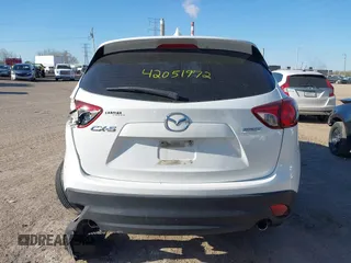 2014 Mazda CX-5 Sport with VIN JM3KE2BE8E0301175, listed as a IAAI auction lot 42051972 with 121,821 mi miles and . Bid and sale history available at carsss.com. Image 16.