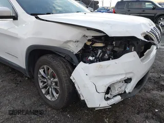 2019 Jeep Cherokee Latitude Plus with VIN 1C4PJMLX2KD254946, listed as a IAAI auction lot 41581777 with 49,748 mi miles. Bid and sale history available at carsss.com. Image 6.