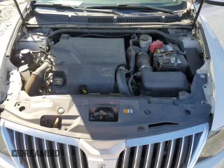 2011 Lincoln MKS EcoBoost with VIN 1LNHL9FT7BG611097, listed as a Copart auction lot 48180885 with 140,262 mi miles and Salvage title. Bid and sale history available at DreamBid. Image 11.
