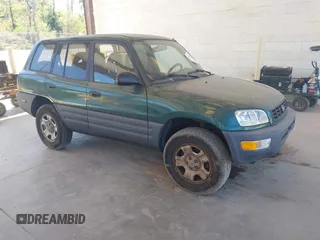 1998 Toyota RAV4 with VIN JT3GP10V4W0020180, listed as a IAAI auction lot 42715463 with 185,320 mi miles and . Bid and sale history available at DreamBid. Image 1.