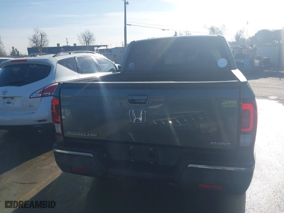 2017 Honda Ridgeline RTL-E with VIN 5FPYK3F77HB012606, listed as a IAAI auction lot 41409677 with 93,943 mi miles. Bid and sale history available at carsss.com. Image 16.