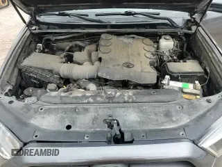 2018 Toyota 4Runner SR5 с VIN JTEBU5JR3J5609431, выставлен на аукционе Copart как лот 71004785 с пробегом 119 130 миль миль и Списание • Salvage title. История ставок и продаж доступна на DreamBid. Изображение 16.