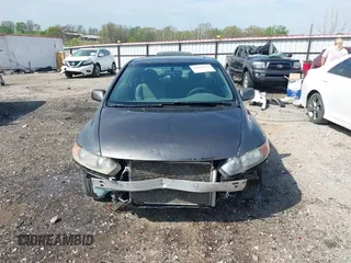 2011 Honda Civic Cpe EX with VIN 2HGFG1B85BH502744, listed as a IAAI auction lot 42010434 with 266,293 mi miles. Bid and sale history available at carsss.com. Image 13.