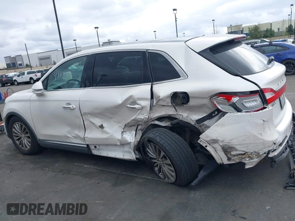 2016 Lincoln MKX Select with VIN 2LMTJ6KR5GBL30010, listed as a IAAI auction lot 41741385 with 112,647 mi miles. Bid and sale history available at carsss.com. Image 14.