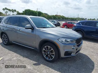 2016 BMW X5 xDrive40e with VIN 5UXKT0C58G0S75938, listed as a IAAI auction lot 42021138 with 97,426 mi miles and . Bid and sale history available at carsss.com. Image 1.